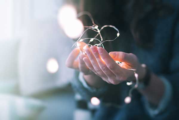 fairy lights in palm of hand